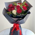 10 red and white roses bouquet arranged elegantly for gifting in Dubai.