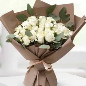 20 white roses bouquet with fresh greens - luxury flower delivery in Dubai