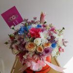 Royal Collection luxury flower box with pink lily, pink roses, white roses, and chrysanthemums