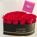 25 red roses elegantly arranged in a black heart-shaped box – My Hearts Belong to You