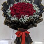 Love Memories bouquet with 30 red roses and gypsophila in black wrap and red ribbon - Dubai florist