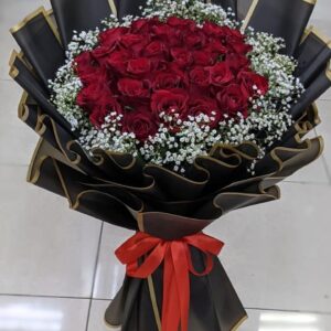 Love Memories bouquet with 30 red roses and gypsophila in black wrap and red ribbon - Dubai florist