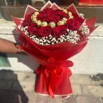 Lovable Combo with 25 red roses and Ferrero Rocher in red wrapping