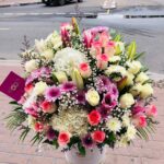 Blooming Box with white hydrangeas, pink roses, pink lilies, white roses, and chrysanthemums in a white box – Dubai flower delivery