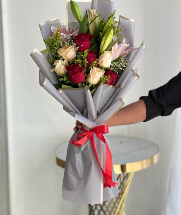 Buy My Cutie Pie Bouquet – Red & Peach Roses with Pink Lily in Dubai